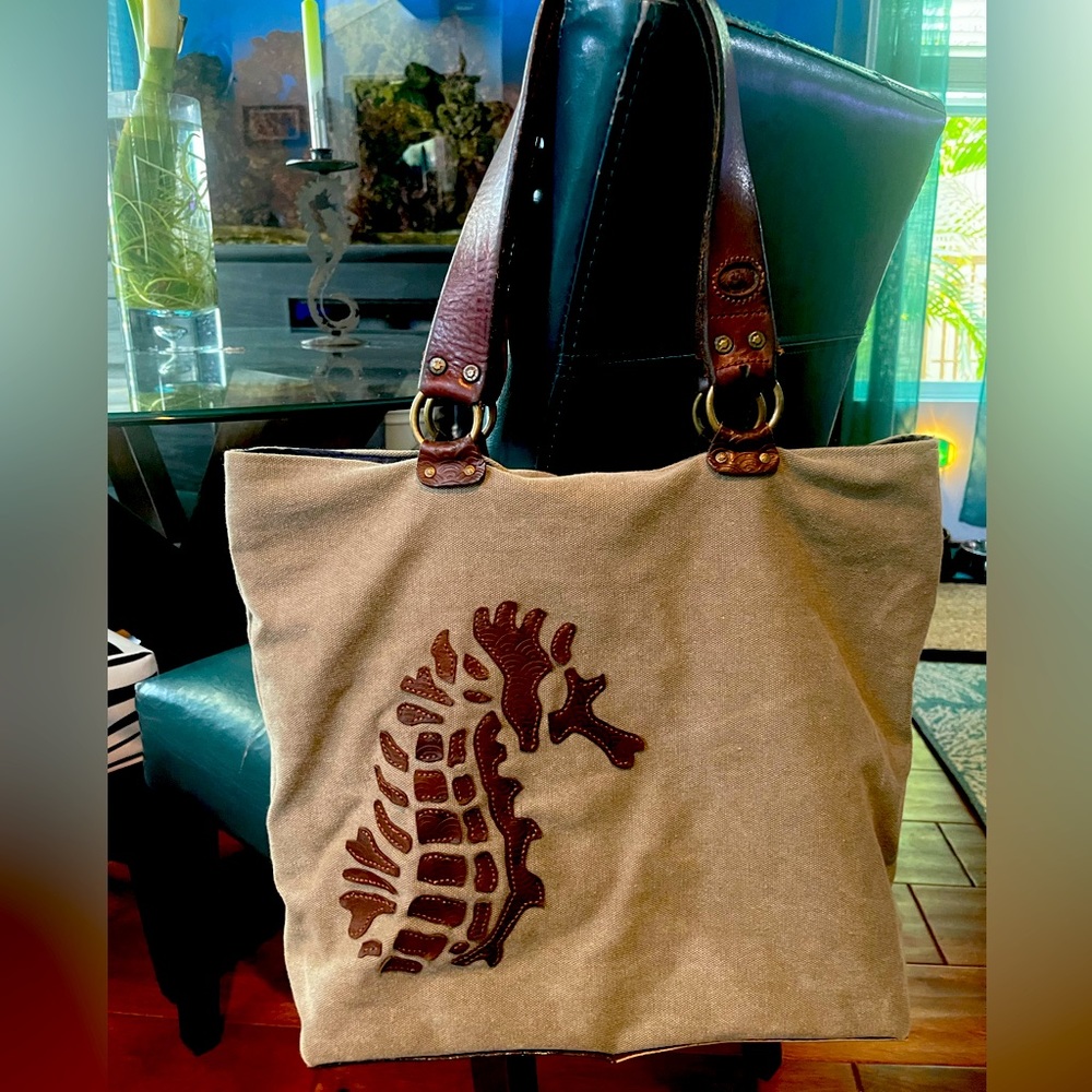 Leather & khaki canvas tote. Only one, handmade by local Hawaiian artist.